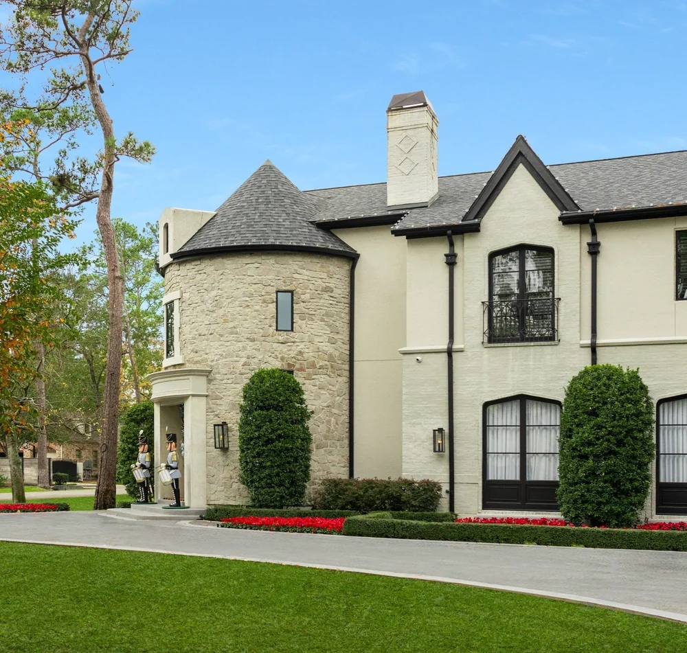 Contemporary estate, River Oaks — architecture-led planting design, motorized gate surround, and smart lighting integration.